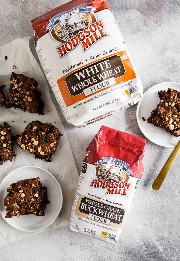 These hazelnut buckwheat brownies are packed full of dark chocolate, semisweet chocolate chips, and chopped hazelnuts. They are super fudgy and made with a delicious mix of buckwheat and white whole wheat flour. Trust me, you'll love these brownies! 