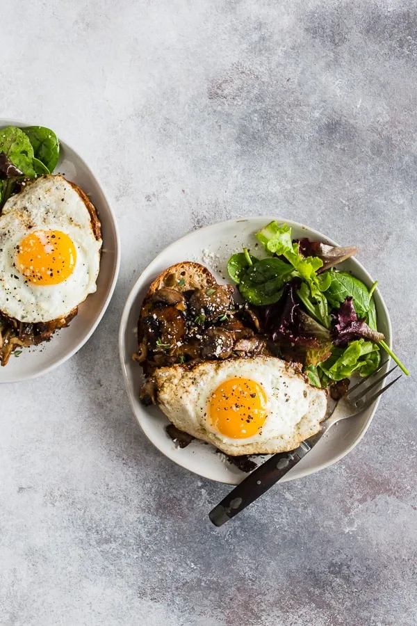 This garlic wild mushrooms on toast is a flavorful way to start your day. Perfectly toasted sourdough bread covered with sauteed mushrooms with garlic and herbs and topped with a fried egg. It's super flavorful and makes a great breakfast, lunch or dinner. 