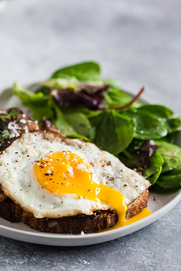 This garlic wild mushrooms on toast is a flavorful way to start your day. Perfectly toasted sourdough bread covered with sauteed mushrooms with garlic and herbs and topped with a fried egg. It's super flavorful and makes a great breakfast, lunch or dinner. 