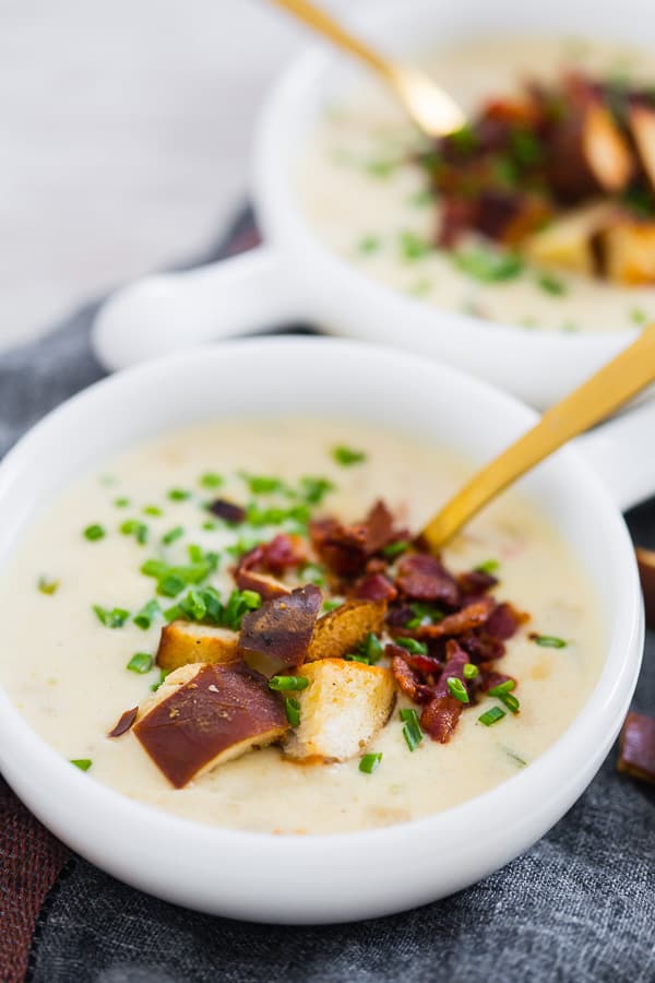 This spicy sharp cheddar beer soup is the perfect cheesy soup you need for cold spring nights. It’s slightly spicy with the addition of fresh jalapeno and pepper jack cheese with just the right splash of beer flavor and sharp cheddar. Perfect when topped with homemade soft pretzel croutons, fresh chives, and crispy bacon.