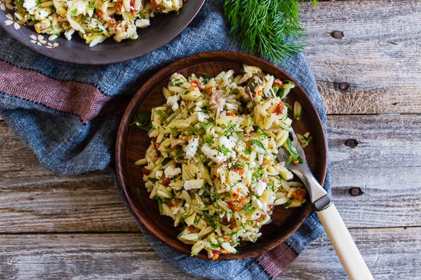 Mediterranean Tuna Orzo Salad on a plate with a fork. 