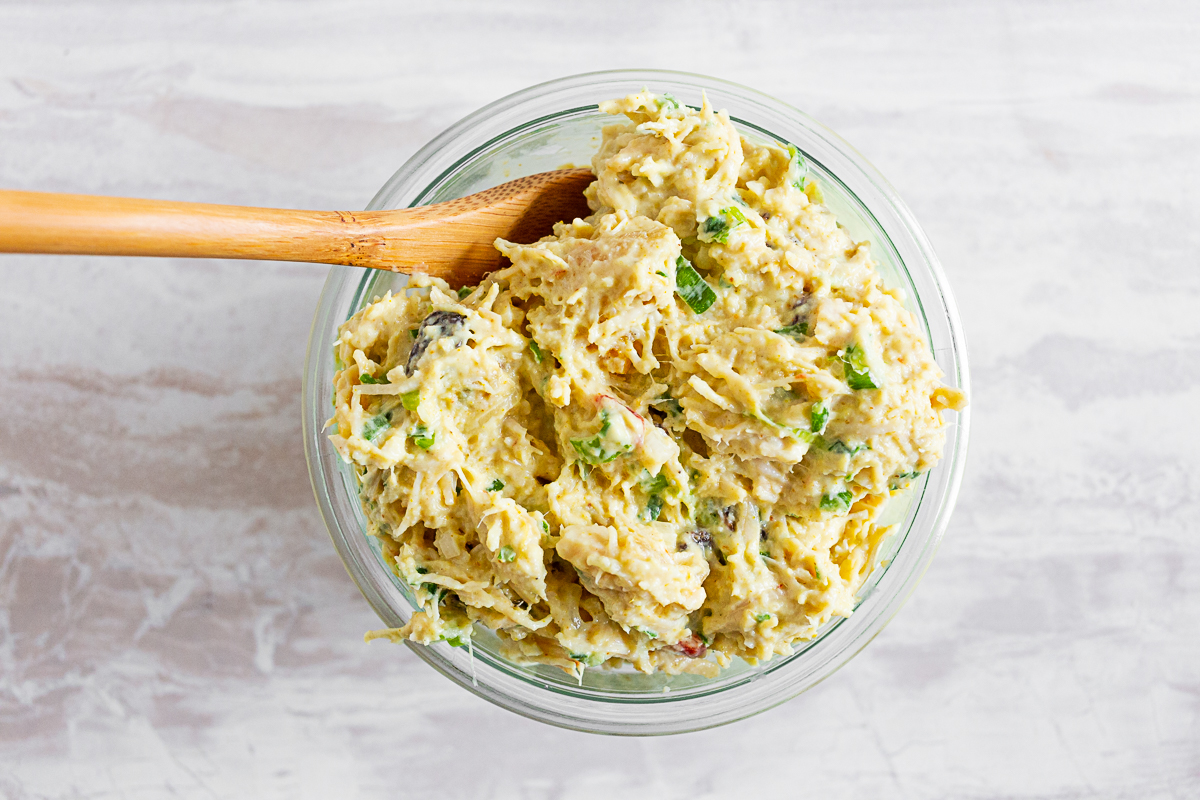 curry chicken salad in a small glass bowl. 