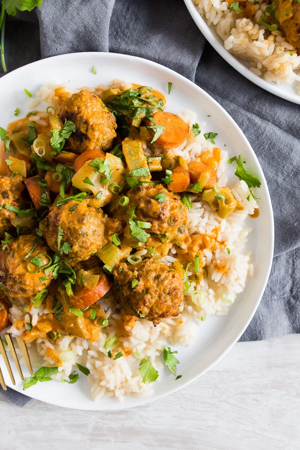 These red curry turkey meatballs are packed full of flavor and come together in no time for a quick weeknight meal. You can even make the meatballs in advance to make the meal come together even quicker! 