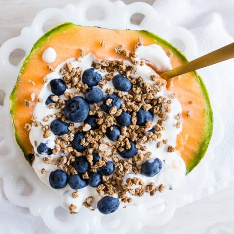 This crunchy yogurt cantaloupe breakfast bowl is the perfect no-cook breakfast that is full of flavor, fresh summer fruit and protein all topped with crunchy Grape Nuts cereal. You're going to love this quick and easy summertime breakfast bowl. 