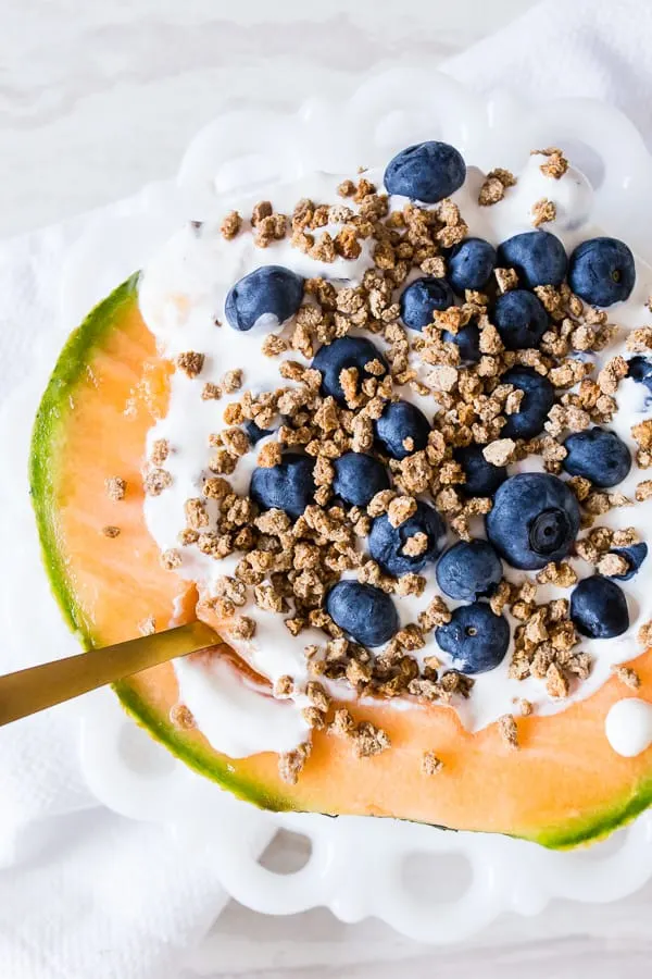 This crunchy yogurt cantaloupe breakfast bowl is the perfect no-cook breakfast that is full of flavor, fresh summer fruit and protein all topped with crunchy Grape Nuts cereal. You're going to love this quick and easy summertime breakfast bowl. 