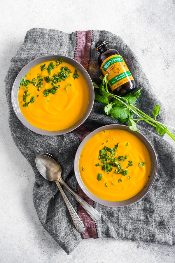 This creamy carrot orange soup cooks in just 30 minutes and is full of fall flavor. Made with a few simple ingredients and pureed until smooth it’s the perfect weeknight rush dinner. Serve with grilled chicken for an extra burst of protein or serve plain for a Meatless Monday treat.