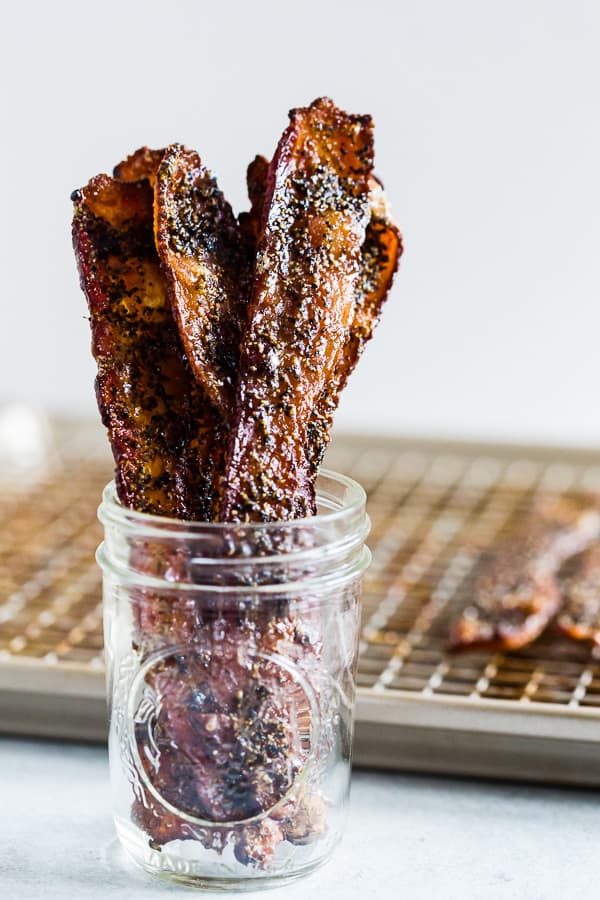 This maple black pepper bacon is the perfect balance of sweet and savory. Eat it as a midday snack or sneak a few bites as a midnight snack. Made with maple syrup, maple sugar and a lot of fresh cracked black pepper. You'll love these crispy little bites. 