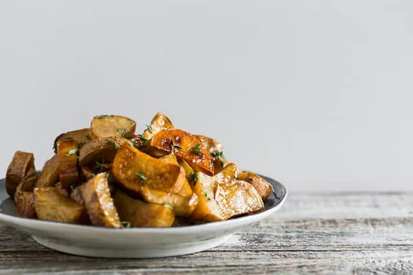 Roasted White Sweet Potatoes served on a serving plate. 