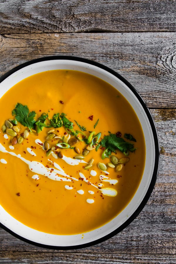 Spicy Thai Pumpkin Soup topped with cilantro and Greek yogurt. 
