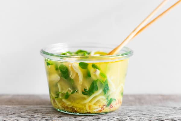 You’re going to love this homemade cup of noodles! It’s made with a homemade soup base, leftover chicken, fresh greens, herbs and cooked noodles. Add boiling water and you have lunch in minutes!