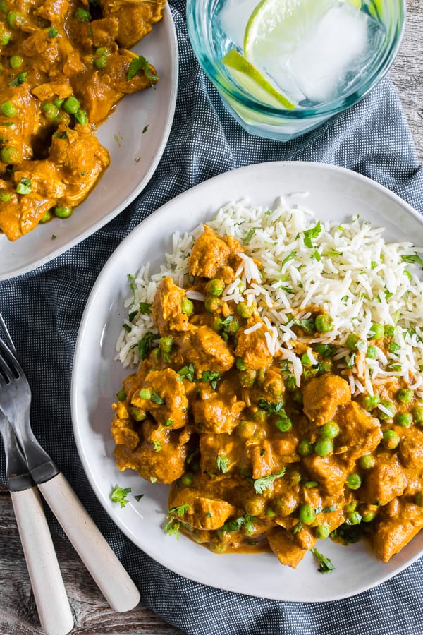 This Instant Pot Chicken Tikka Masala is a flavorful addition to your weekly menu. It's packed with tender chicken swimming in a thick and spice filled tomato coconut milk based sauce with peas served over basmati rice. Super simple to make and packed full of flavor! 