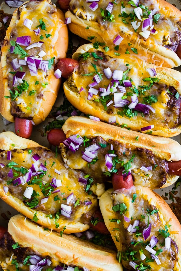 Oven Baked Chili Cheese Dogs sprinkled with cilantro. 