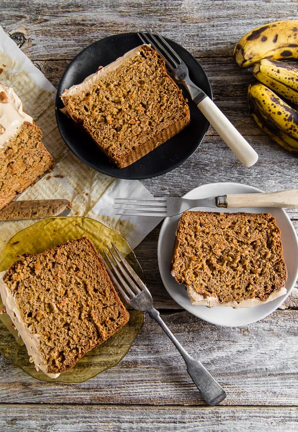 This carrot cake banana bread is topped with a creamy maple cream cheese frosting and the perfect use for ripe bananas. It's a flavorful twist to a classic quick bread that you're sure to love.