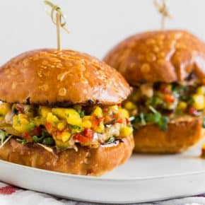 These chipotle chicken burgers are topped with fiery pepper jack cheese and fresh homemade mango salsa. Trust me, this burger is packed full of flavor and the perfect addition to your summer BBQ. 