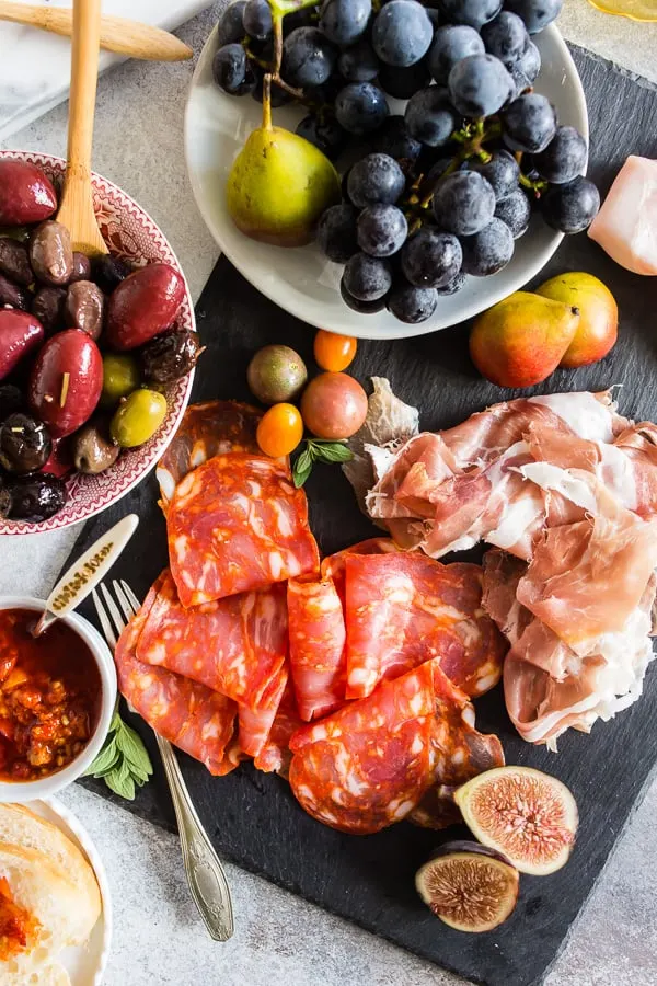 meats, fruit and olives on Ultimate Italian Antipasto Platter