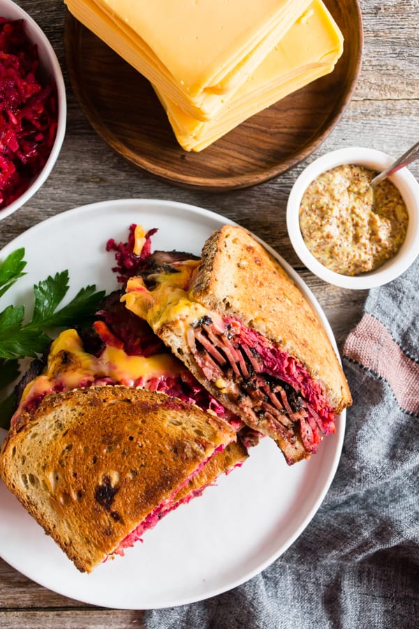 This grilled pastrami root vegetable slaw sandwich is the perfect autumn sandwich. It’s grilled until the outside is crispy and the inside is perfectly warmed through. Plus, the addition of a homemade root vegetable slaw takes this sandwich to a whole new level of deliciousness.