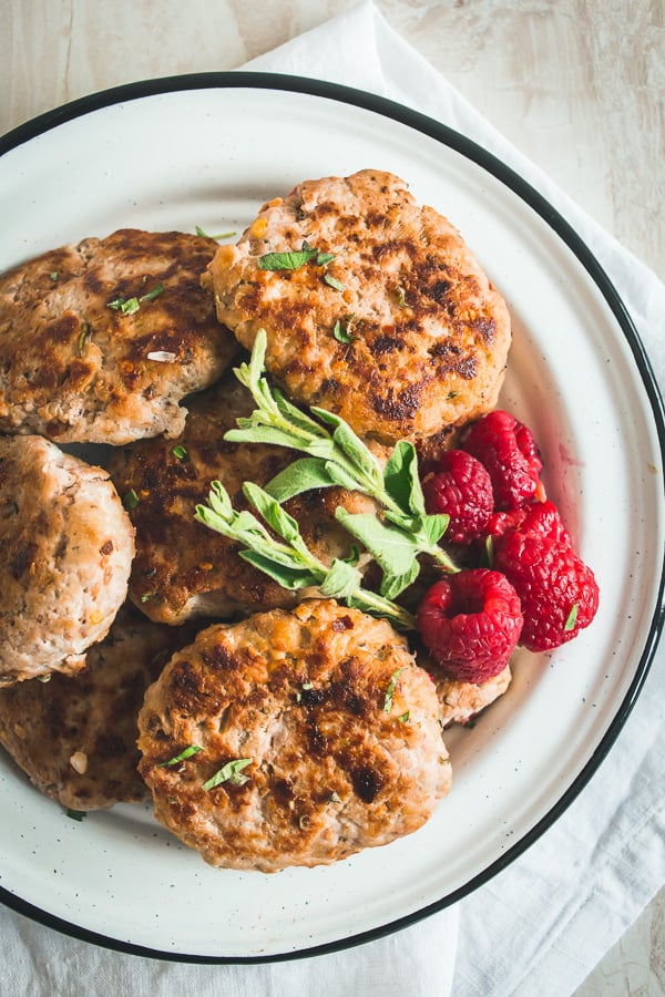 raspberry herb chicken sausage patties on a plate