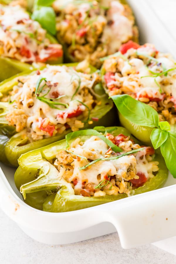 ground chicken stuffed bell peppers in a dish 