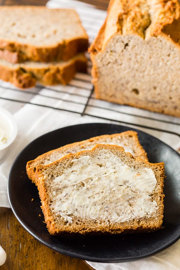 sliced sourdough banana bread with butter on the bread