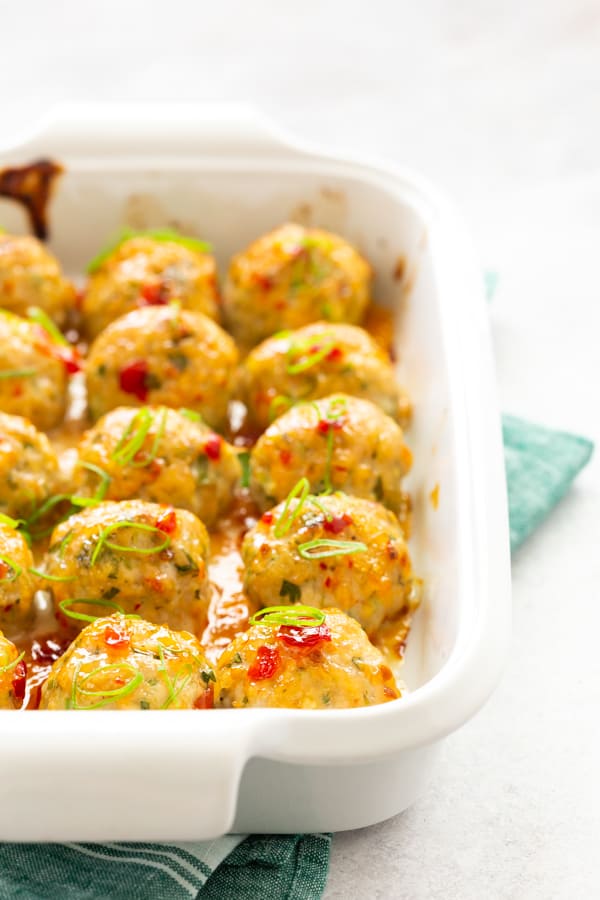 easy thai baked chicken meatballs in a white dish