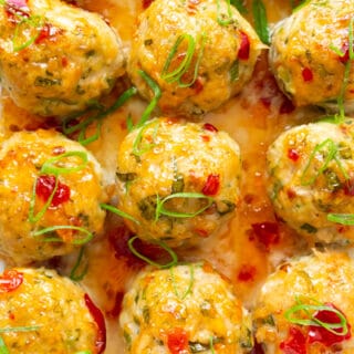 easy thai baked chicken meatballs sprinkled with green onions