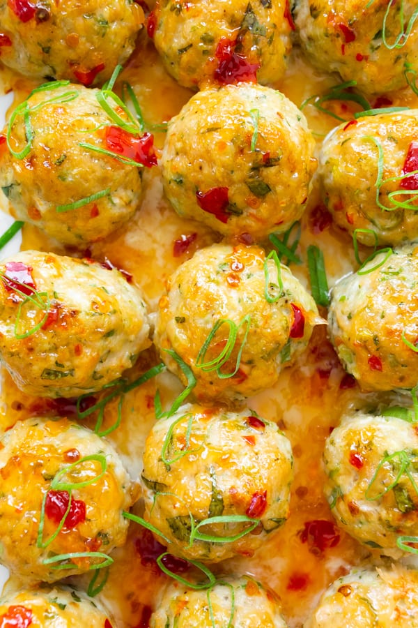 easy thai baked chicken meatballs in a pan up close