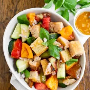 grilled sourdough panzanella salad with tomato water dressing