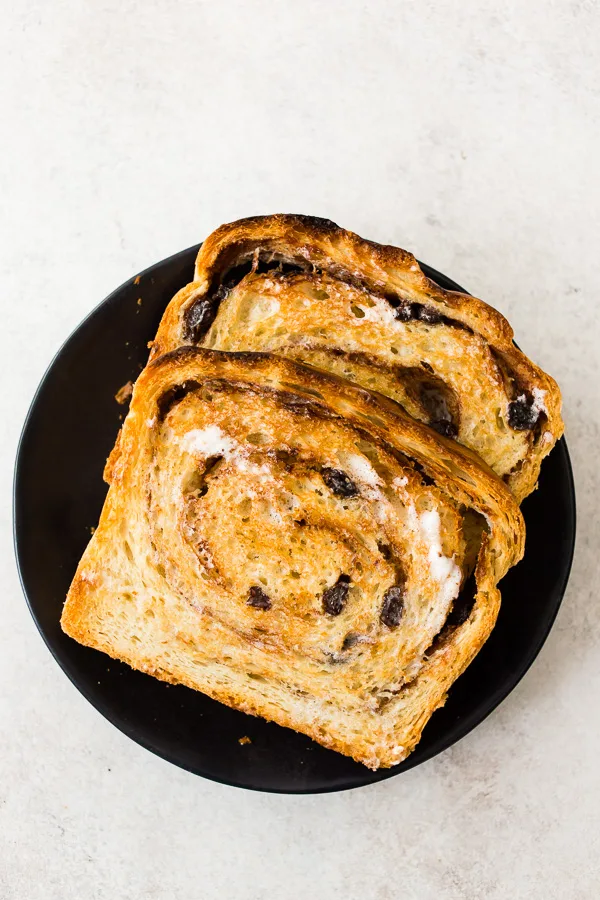 cinnamon raisin sourdough bread sliced and toasted with butter