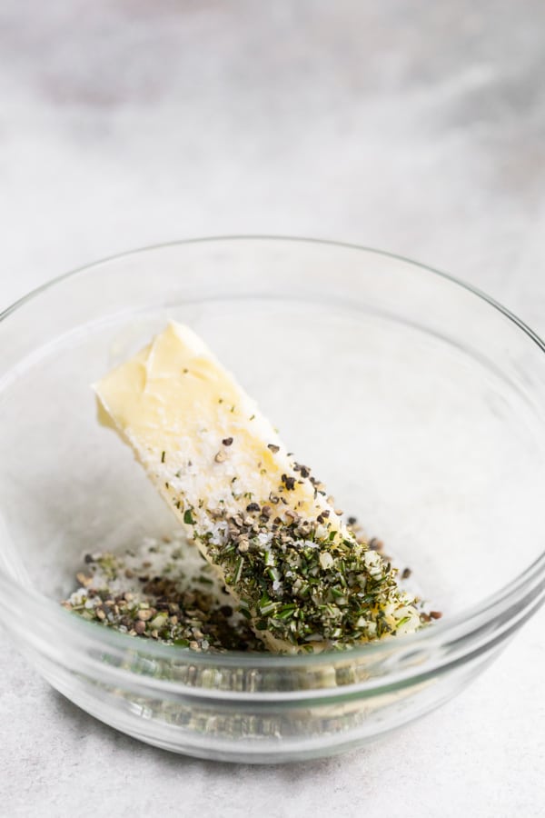 garlic herb compound butter ingredients in a bowl