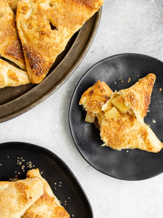 easy apple turnovers cut open on a plate