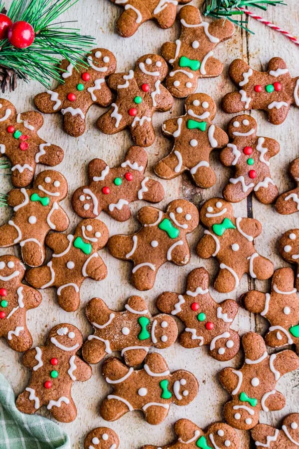 soft gingerbread cutout cookies laid out on a board
