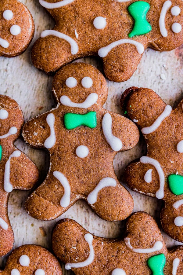 soft gingerbread cutout cookies laying on parchment paper