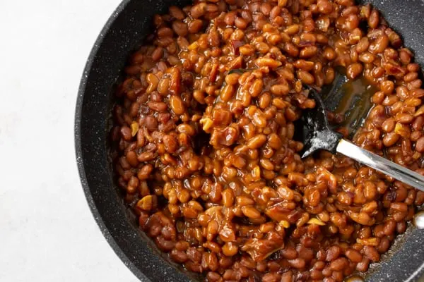 easy bacon baked beans cooked in a skillet.