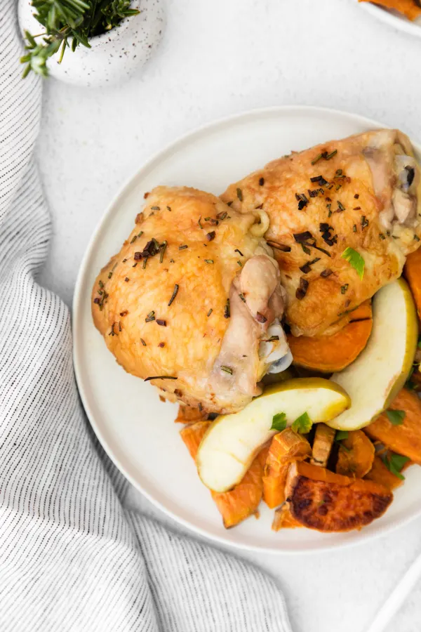 Sheet Pan Chicken and Apples served on a plate. 