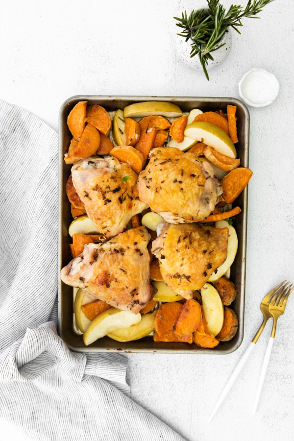 Sheet Pan Chicken and Apples fully cooked served on the sheet pan. 