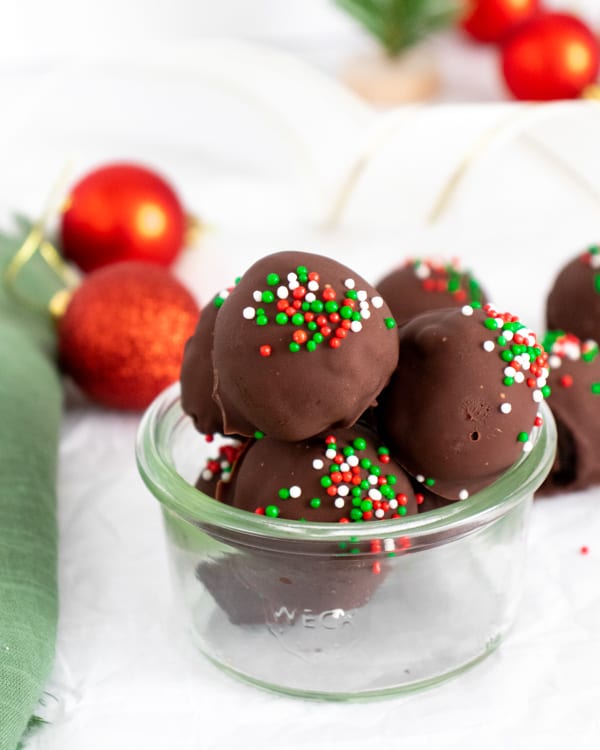 Christmas Oreo Truffles covered with red and green sprinkles. 