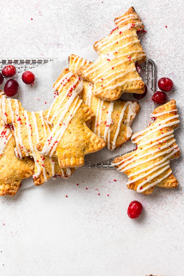 Cranberry Hand Pies sitting on a cooling tray. 