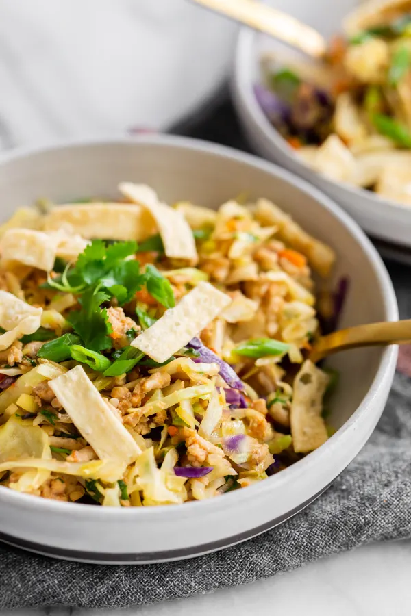 Ground Chicken Egg Roll Bowl topped with wonton strips. 