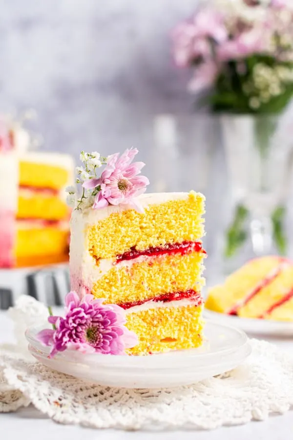 A slice of Strawberry Coconut Layer Cake. 