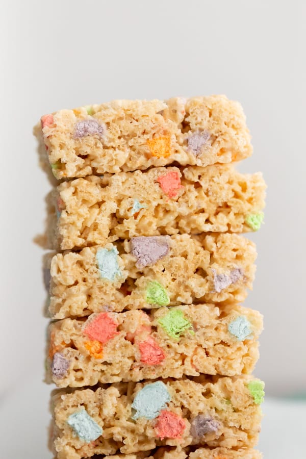 Lucky Charms Rice Krispie Treats sliced and stacked to show layers. 
