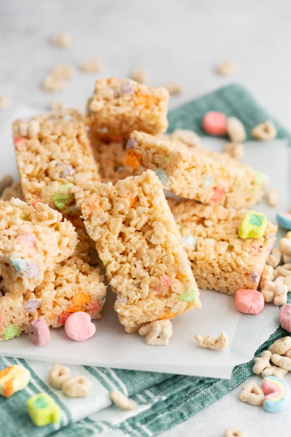 Lucky Charms Rice Krispie Treats topped with extra marshmallows. 