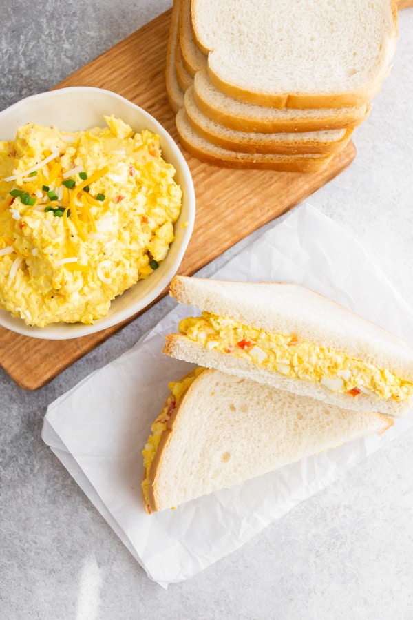 Pimento Cheese Egg Salad served on white soft bread. 