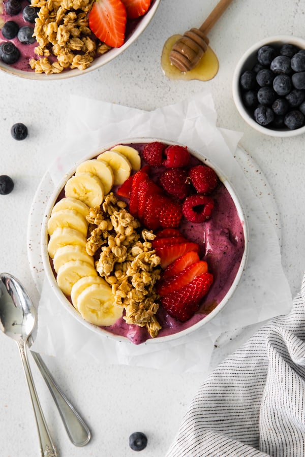 Acai Bowl topped with fresh fruit. 