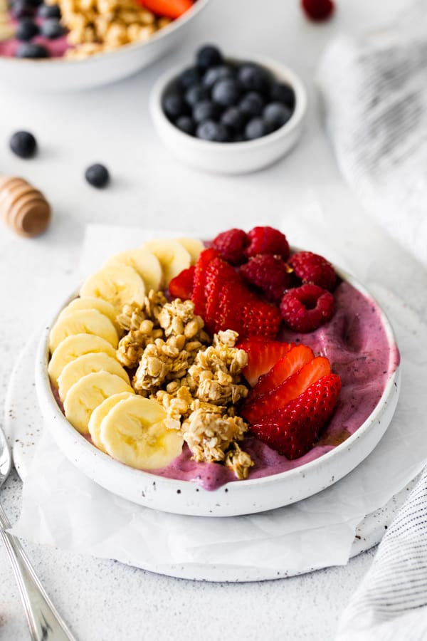 Acai Bowl topped with fresh fruit and granola. 
