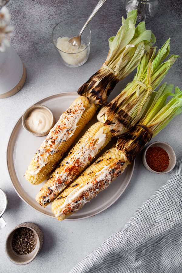 Grilled Mexican Corn on a plate for serving 