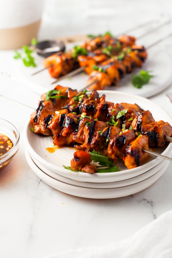 Hot Honey Chicken Skewers on a plate. 