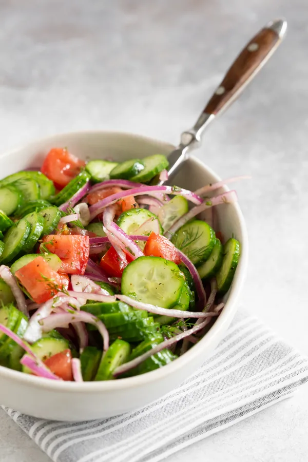 Cucumber Tomato Salad in a serving bowl. 