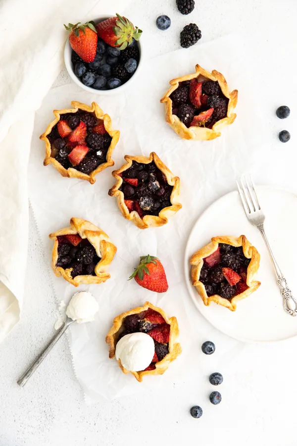 Mini Berry Galettes served with ice cream. 