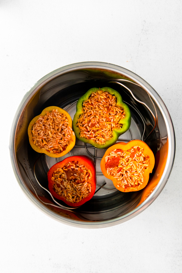 Instant Pot Stuffed Peppers inside the instant pot container. 