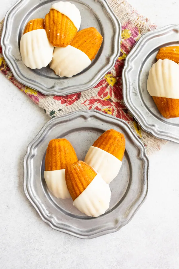 Spiced Pumpkin Madeleines dipped in white chocolate. 